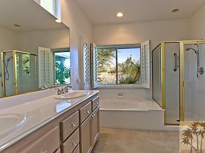 5 White Sun Way Rancho Mirage, CA 92270 - Photo 16 of 24 a spacious bathroom with a tub and sink