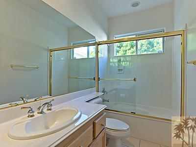 5 White Sun Way Rancho Mirage, CA 92270 - Photo 19 of 24 a bathroom with a sink toilet and shower
