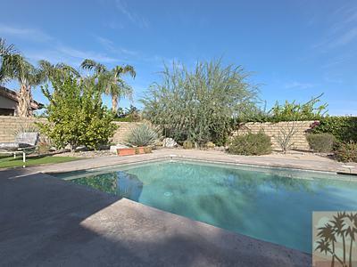 5 White Sun Way Rancho Mirage, CA 92270 - Photo 23 of 24 a backyard of a house with lots of green space
