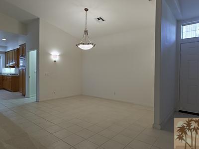 5 White Sun Way Rancho Mirage, CA 92270 - Photo 5 of 24 en empty room with windows