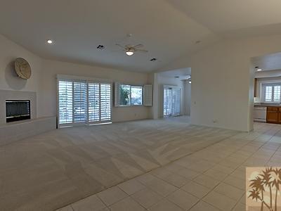 5 White Sun Way Rancho Mirage, CA 92270 - Photo 7 of 24 an empty room with windows and fireplace