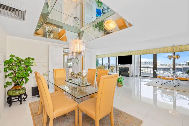 a bedroom with a bed and large window