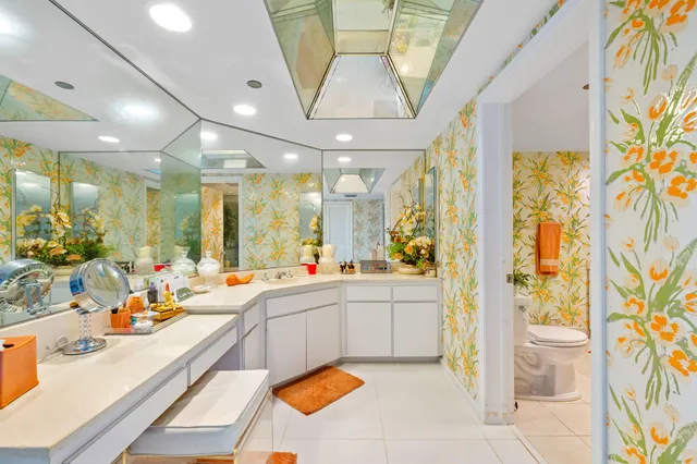 a bathroom with a tub sink and shower