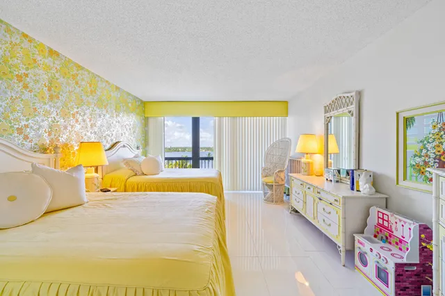 a bathroom with 2 sink and a mirror