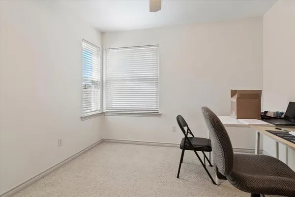 an empty room with wooden door