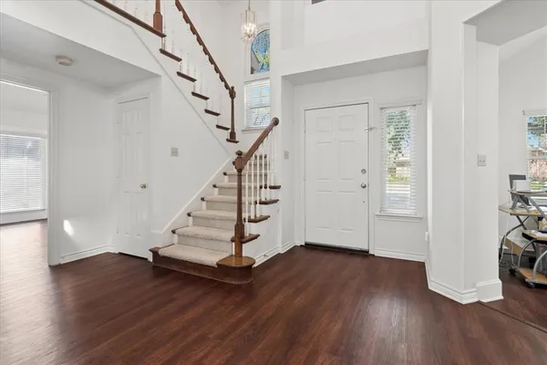 a view of entryway with wooden floor