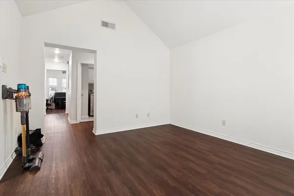 a view of livingroom with hardwood floor and a ceiling fan