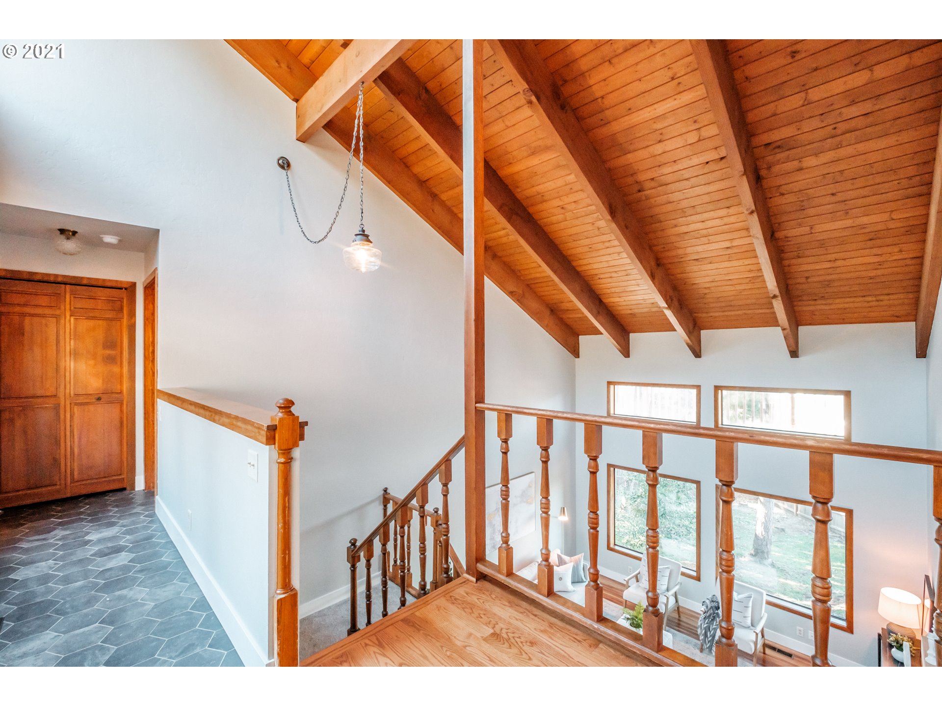 7249 Daisy Street Springfield, OR 97478 - Photo 3 of 32 a view of staircase with railing and white walls
