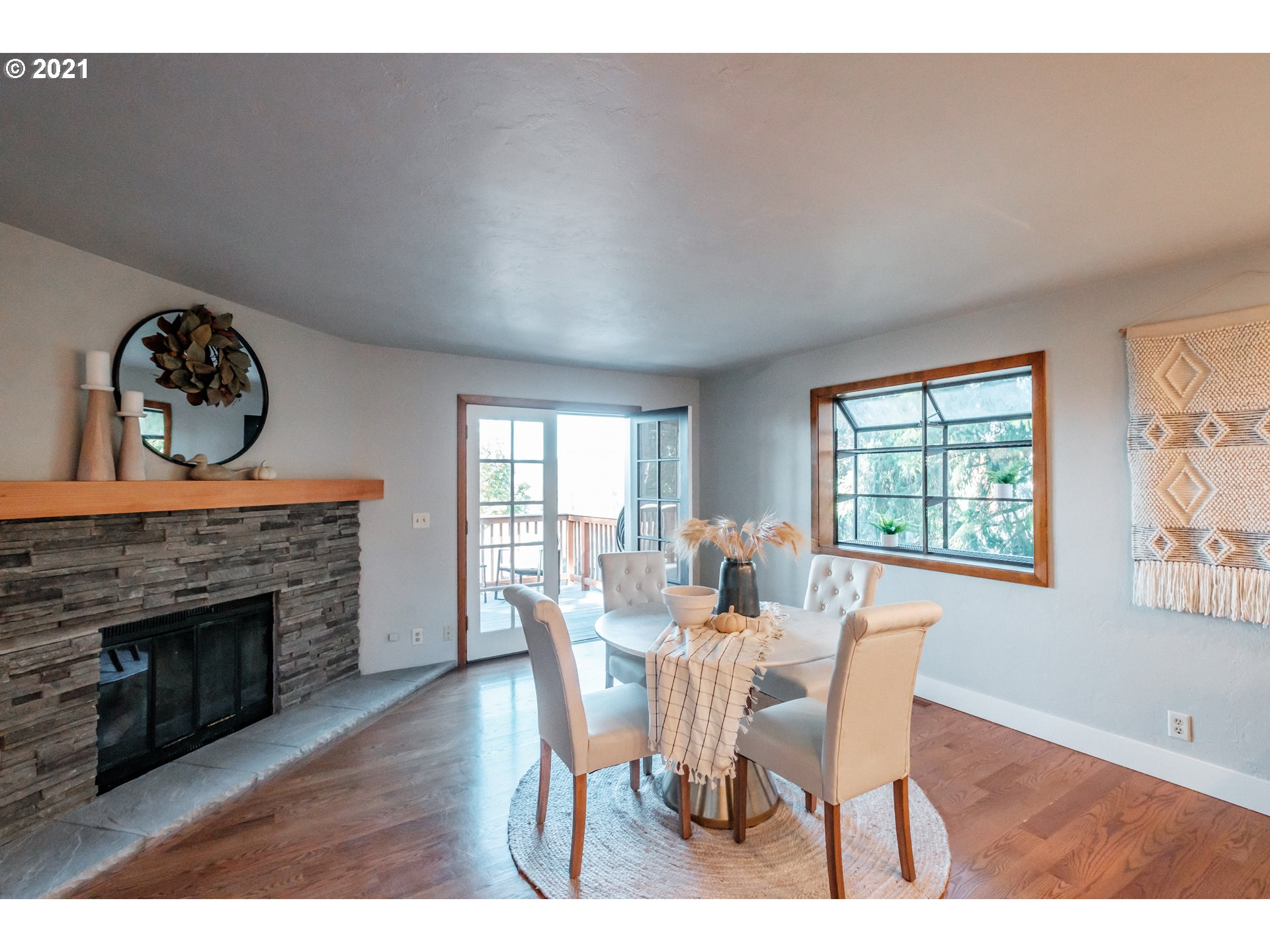 7249 Daisy Street Springfield, OR 97478 - Photo 4 of 32 a view of a dining room with furniture window and wooden floor
