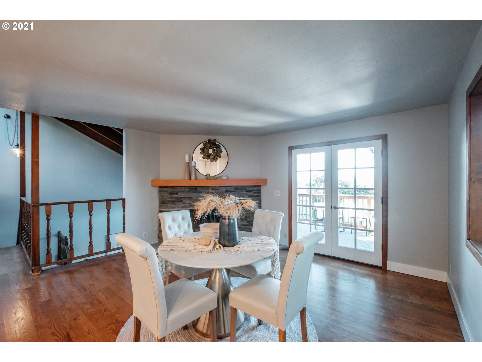 7249 Daisy Street Springfield, OR 97478 - Photo 5 of 32 a view of a dining room with furniture and wooden floor