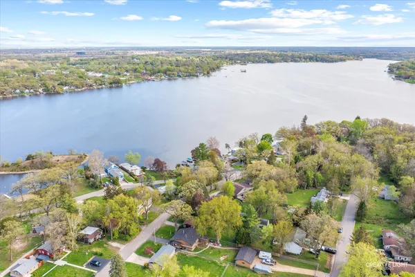 a view of a lake with a houses