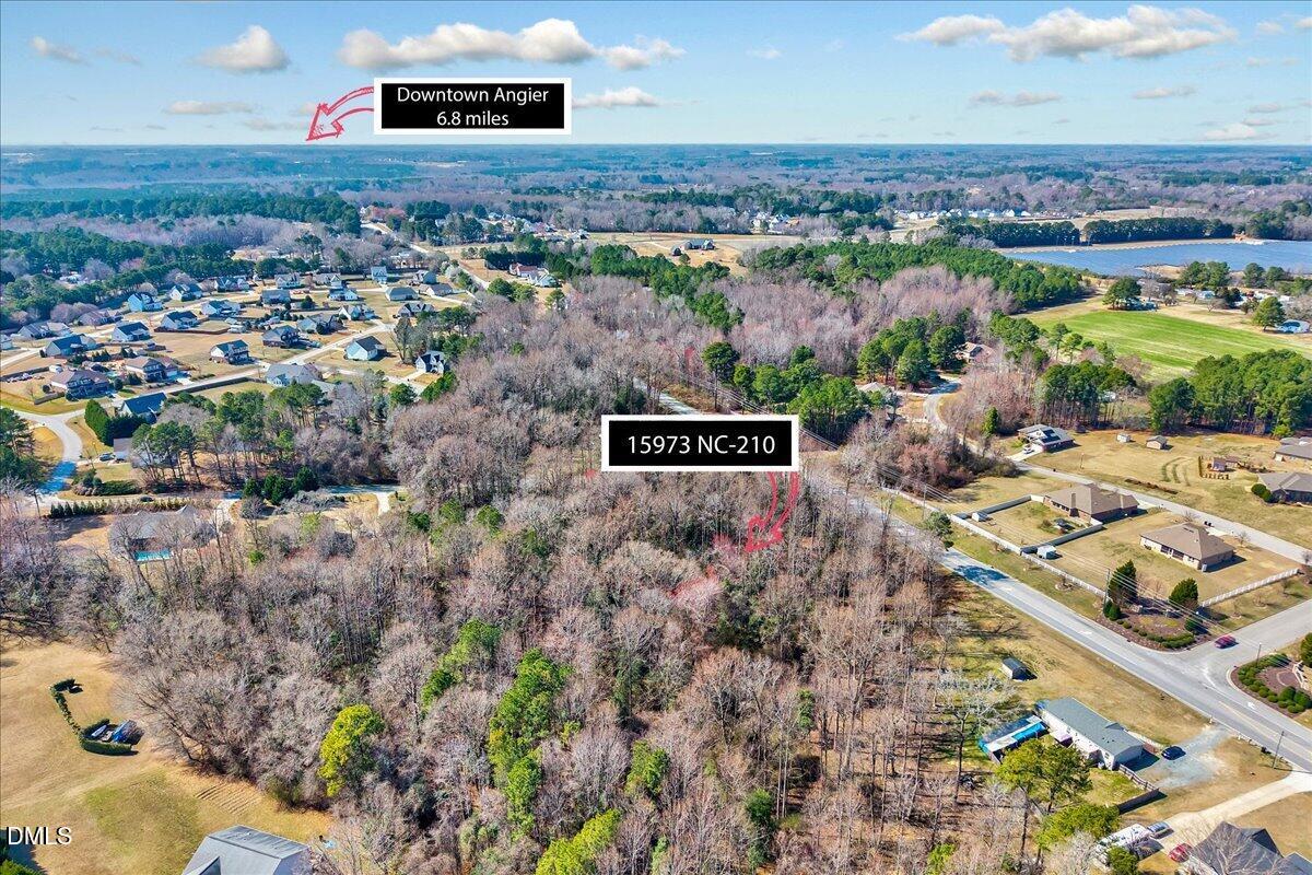 15973 Highway 210 Angier, NC 27501 - Photo 7 of 12 an aerial view of multiple house