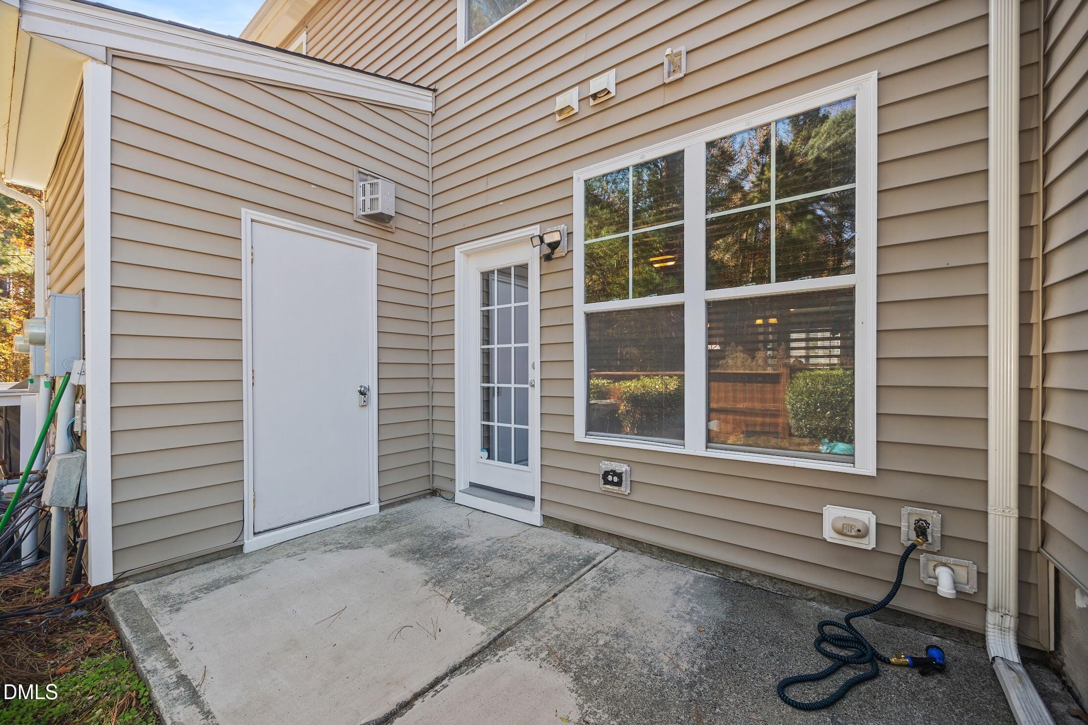2940 Casona Way Raleigh, NC 27616 - Photo 15 of 23 a view of a house with a patio