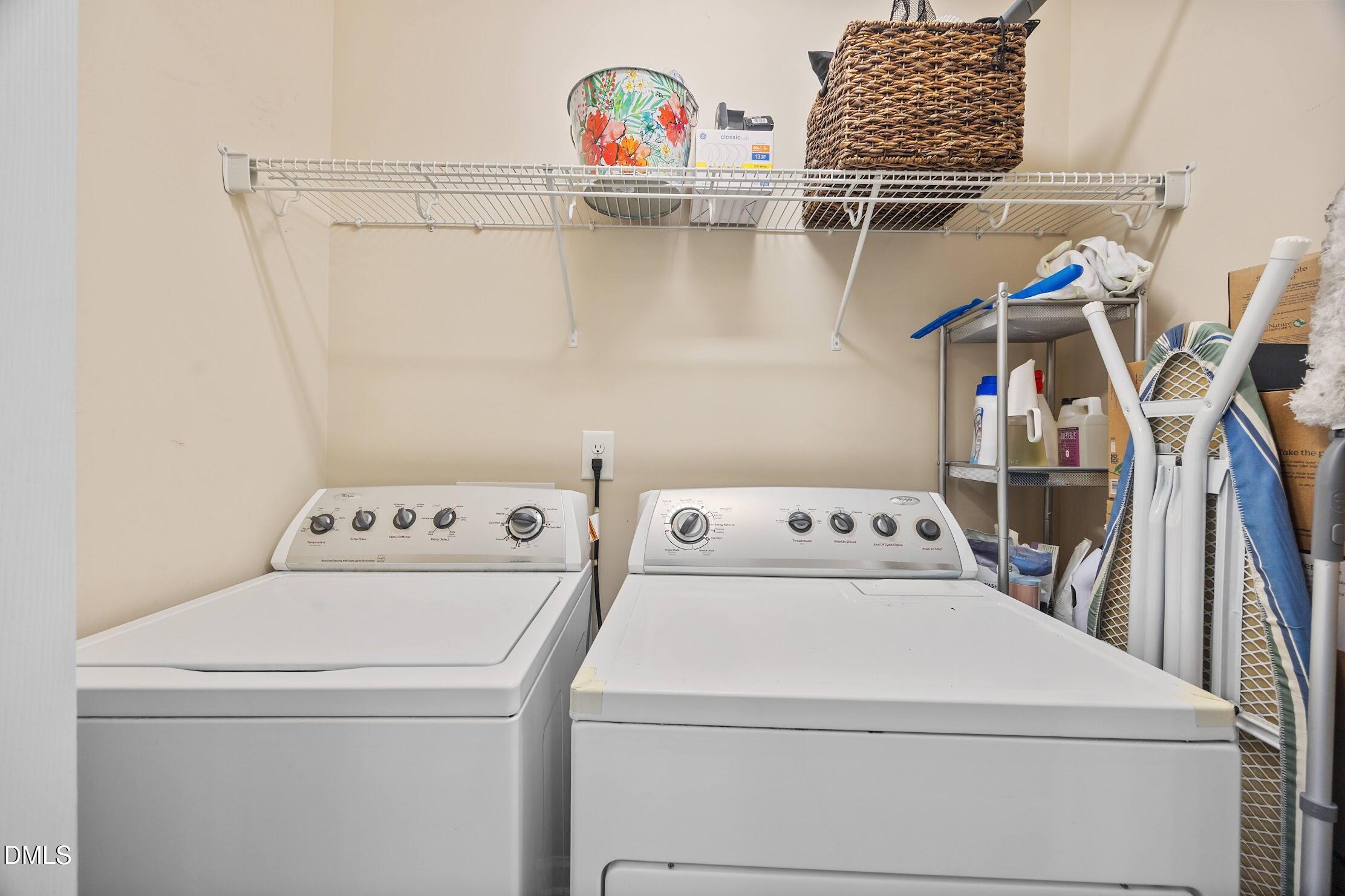 2940 Casona Way Raleigh, NC 27616 - Photo 17 of 23 a utility room with dryer and washer