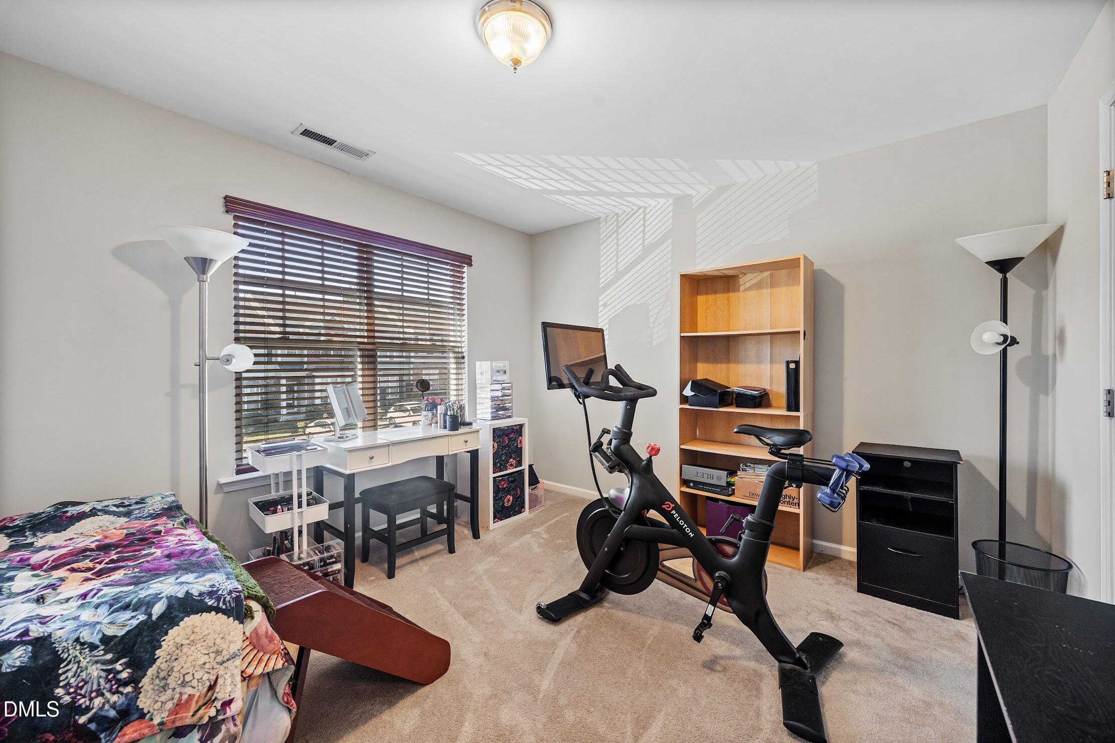 2940 Casona Way Raleigh, NC 27616 - Photo 20 of 23 a view of a livingroom with workspace and a window