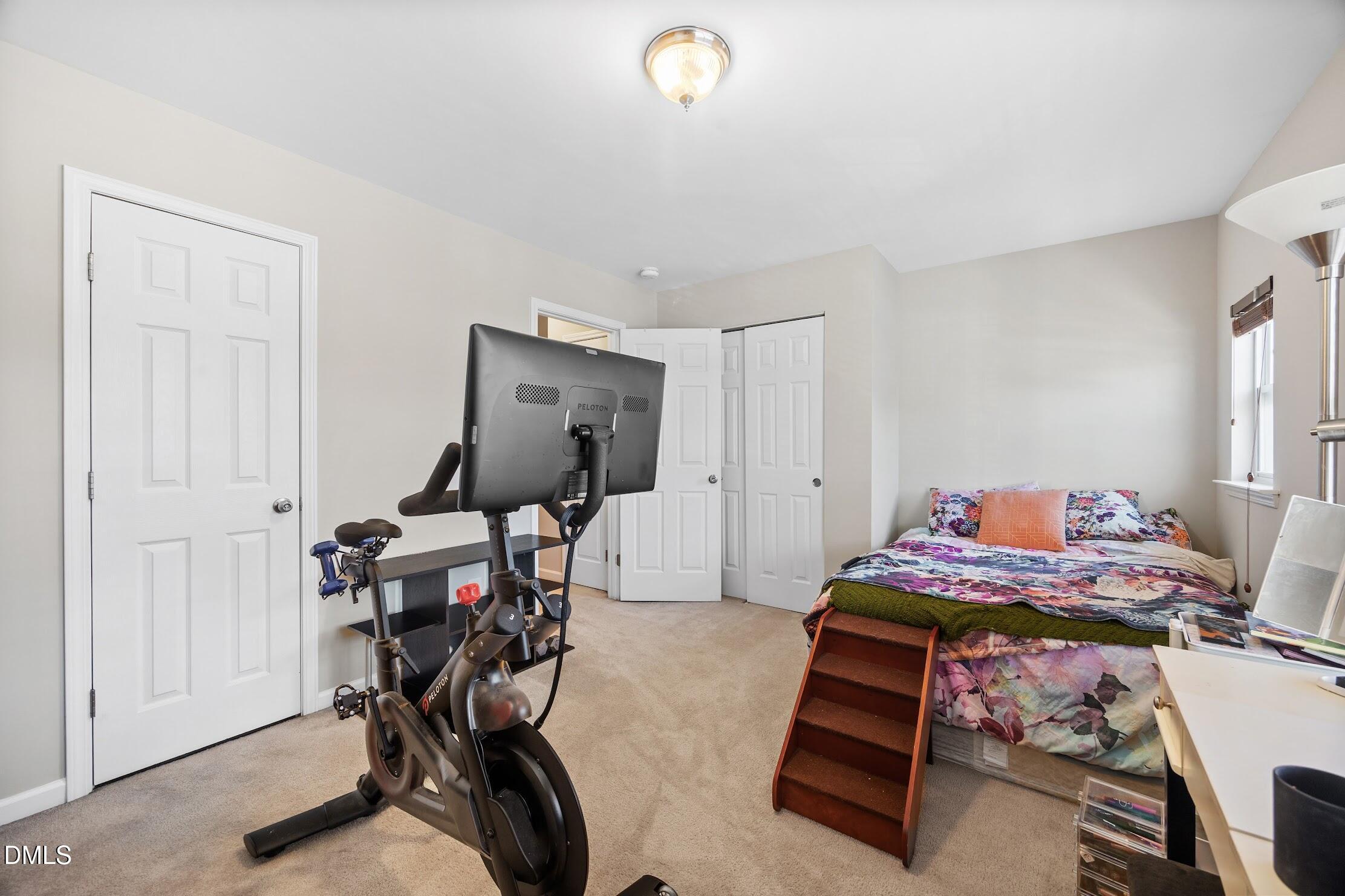 2940 Casona Way Raleigh, NC 27616 - Photo 21 of 23 a bedroom with furniture and a window