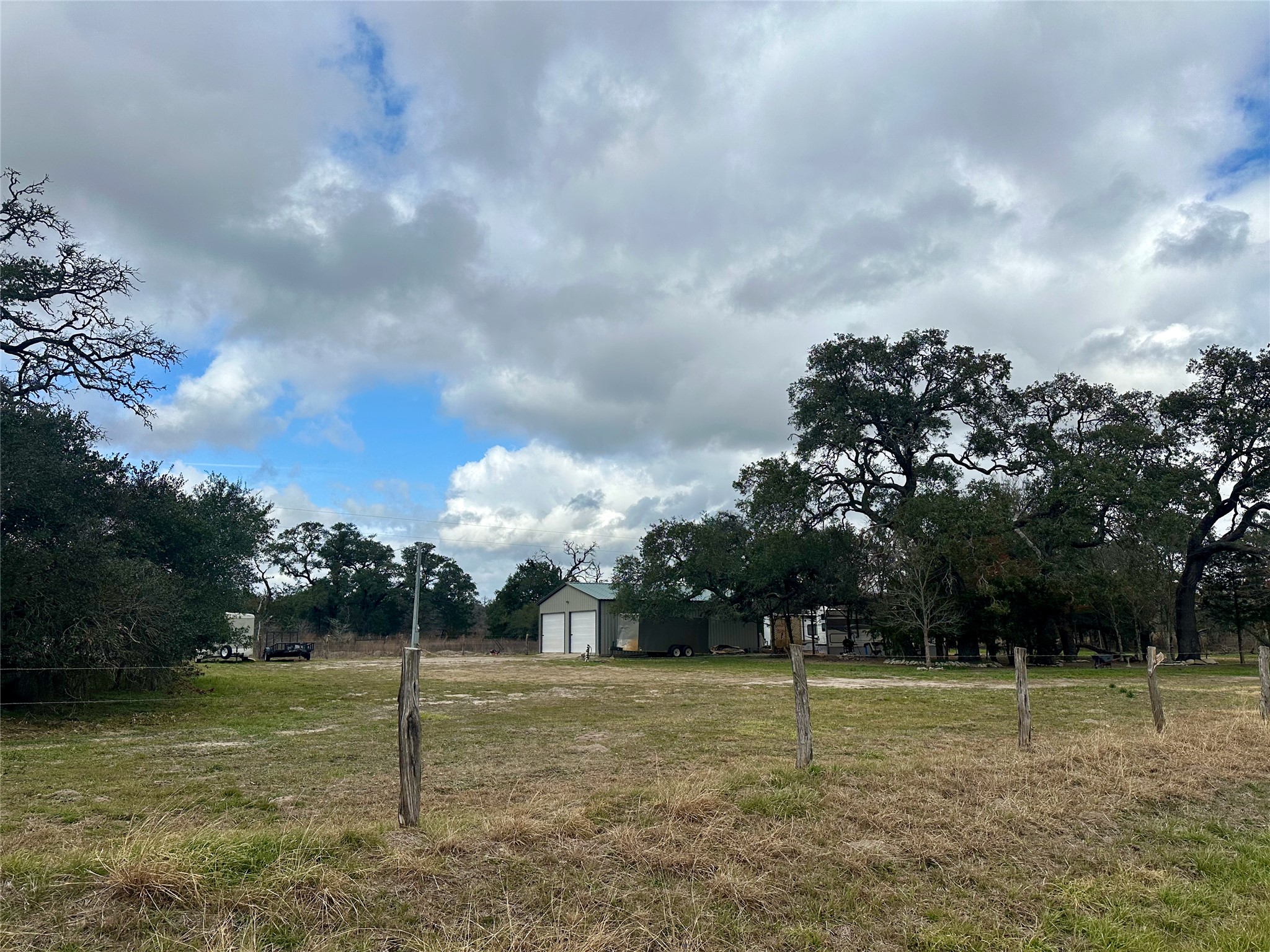 705 Fm 154 Street South Muldoon, TX 78949 - Photo 7 of 18 View of yard featuring an outdoor structure