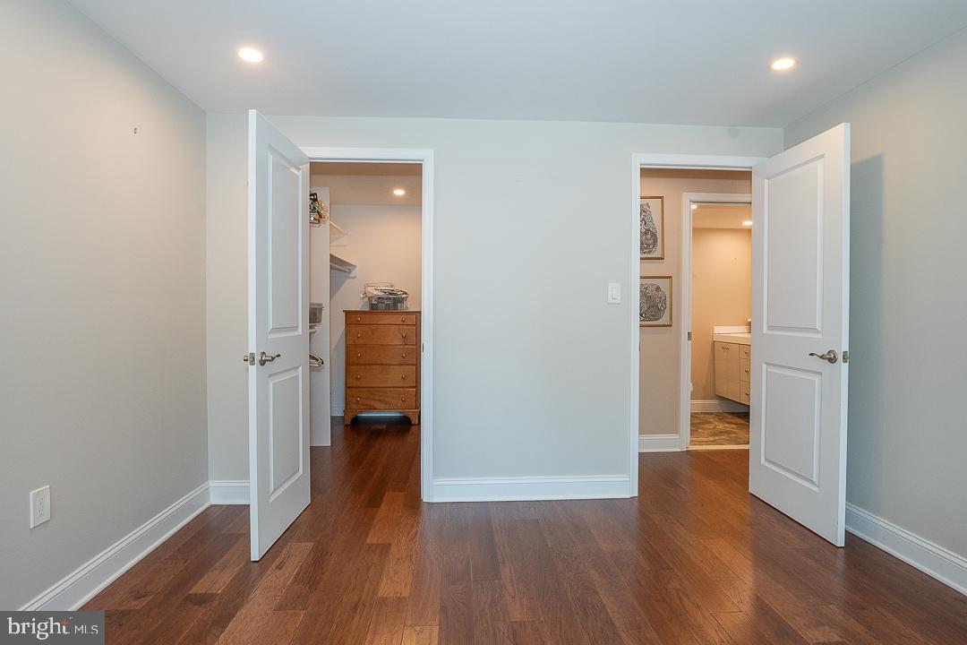 1919 Chestnut Street, Unit 807 Philadelphia, PA 19103 - Photo 13 of 25 a view of a hallway with wooden floor