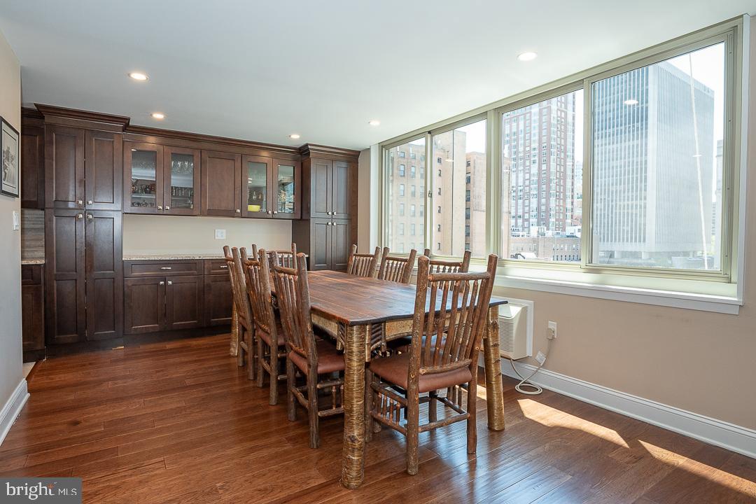 1919 Chestnut Street, Unit 807 Philadelphia, PA 19103 - Photo 3 of 25 a view of a a dining room with furniture window and wooden floor