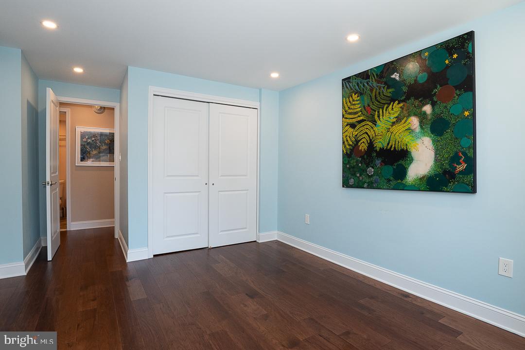 1919 Chestnut Street, Unit 807 Philadelphia, PA 19103 - Photo 9 of 25 a view of a hallway with wooden floor