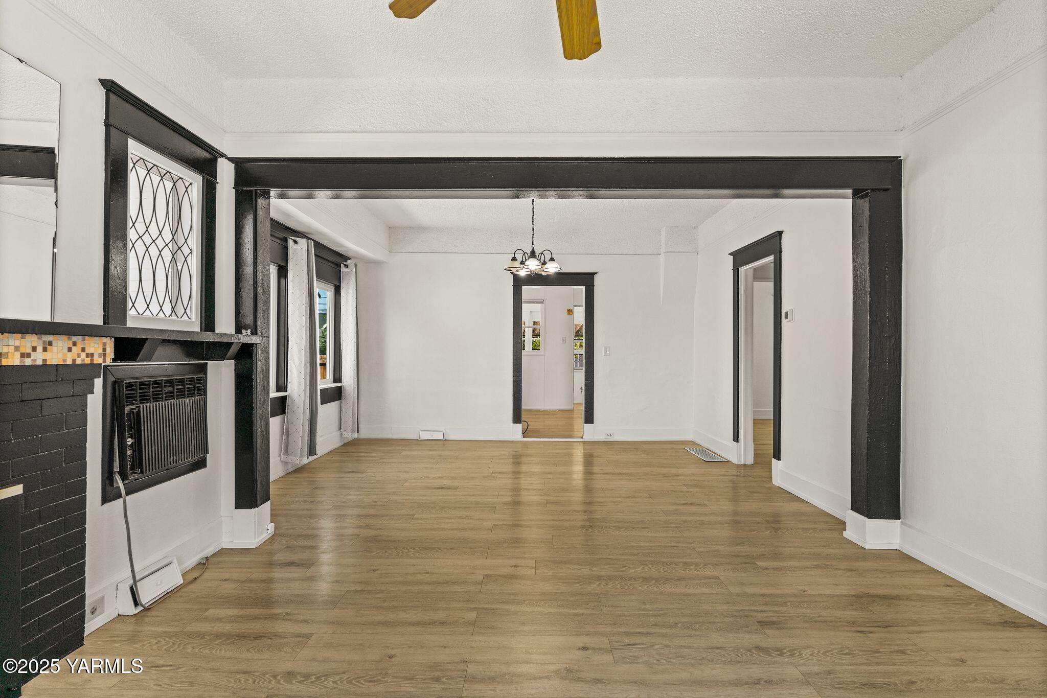 705 South 8th Avenue Yakima, WA 98902 - Photo 7 of 25 a view of an empty room with closet and a window