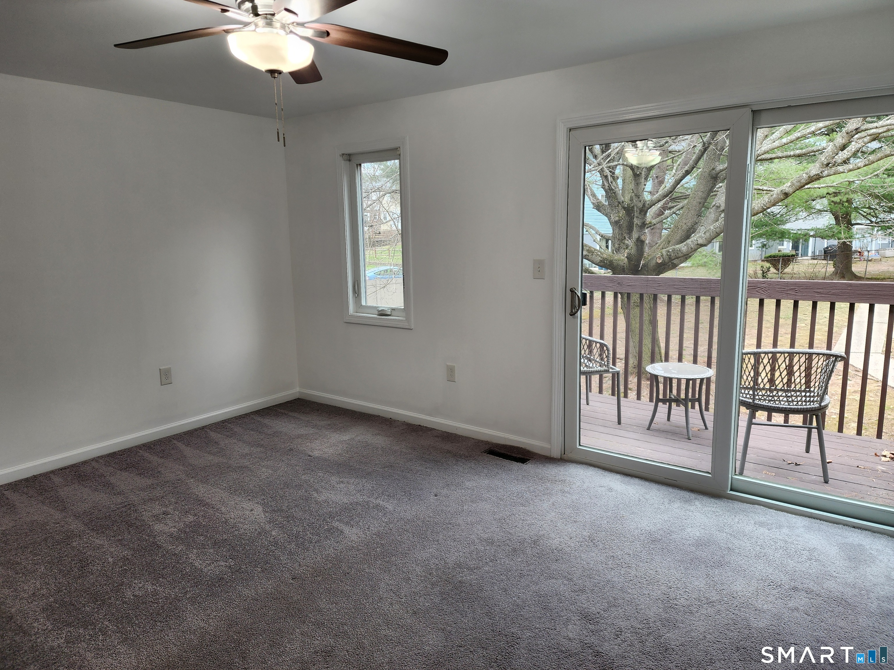 71 Towne House Road, Unit 71 Hamden, CT 06514 - Photo 21 of 32 an empty room with windows