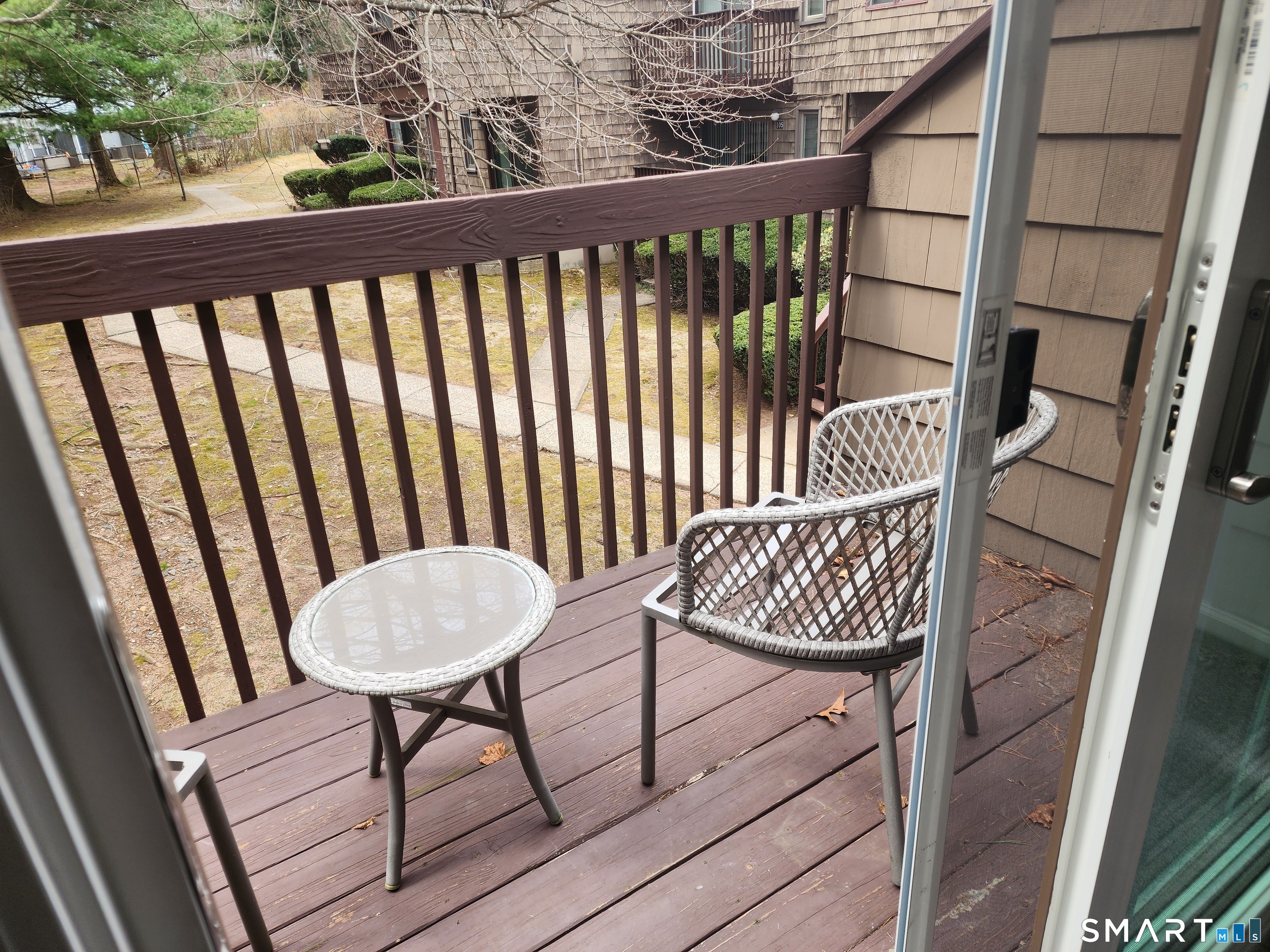 71 Towne House Road, Unit 71 Hamden, CT 06514 - Photo 24 of 32 a view of a chairs in balcony