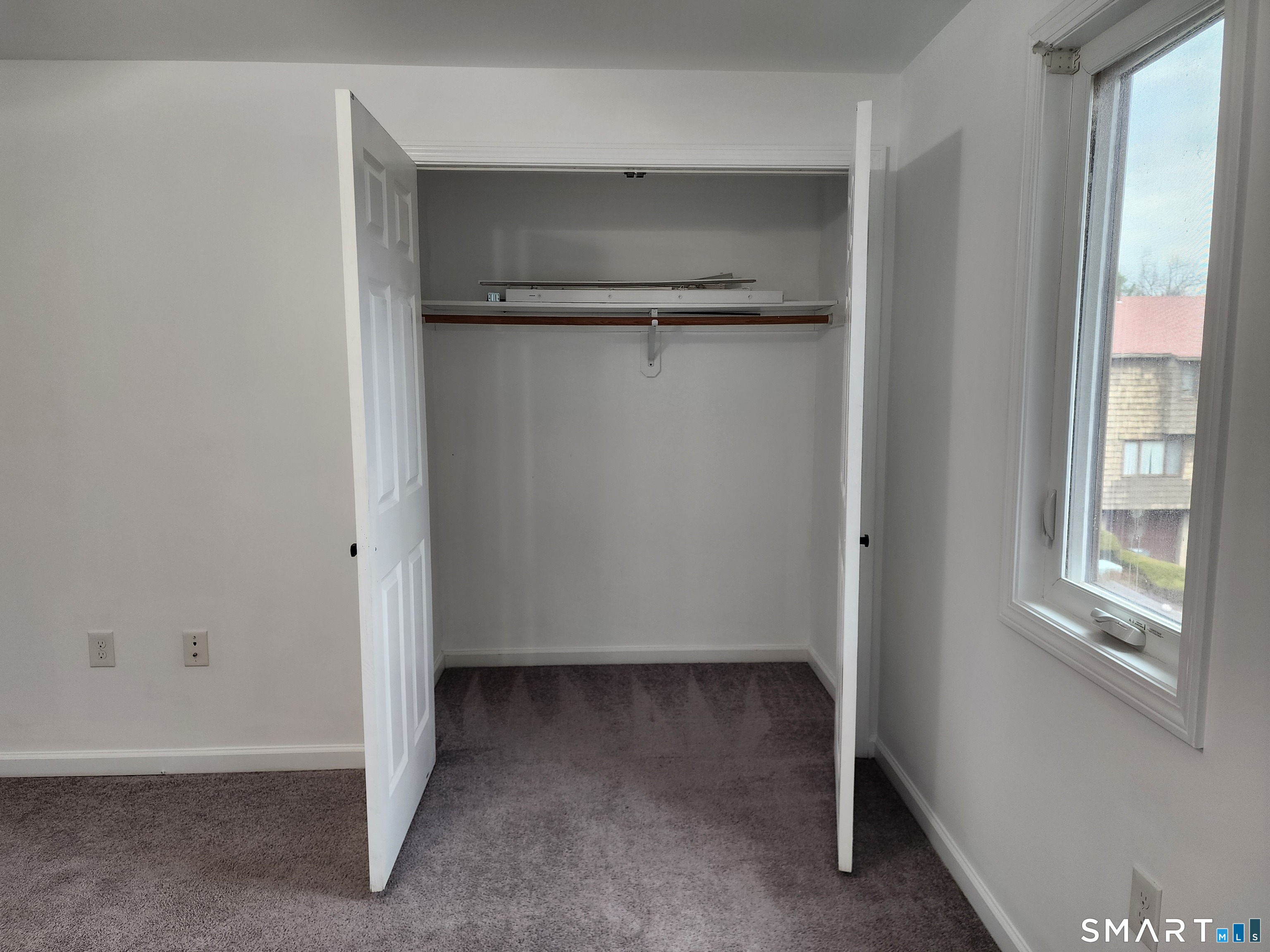 71 Towne House Road, Unit 71 Hamden, CT 06514 - Photo 9 of 32 a view of an empty room