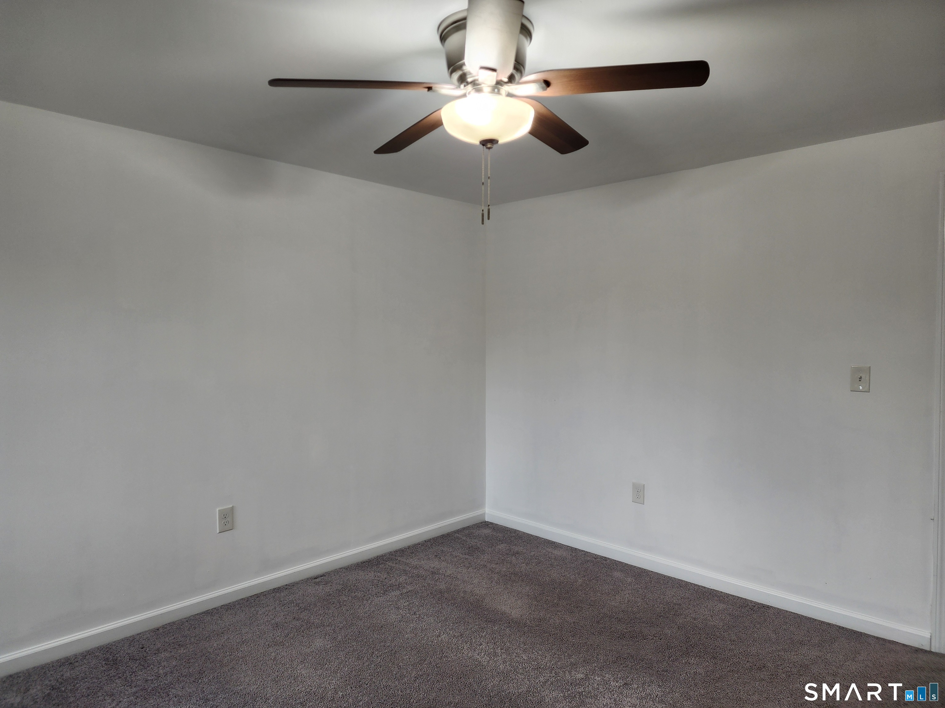 71 Towne House Road, Unit 71 Hamden, CT 06514 - Photo 10 of 32 a view of an empty room