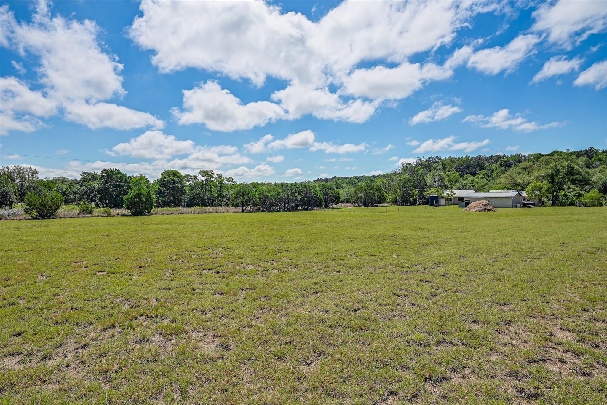 4553 McCall Creek Road Blanco, TX 78606 - Photo 32 of 38 Open pasture is great for livestock