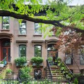 a house view with a garden space