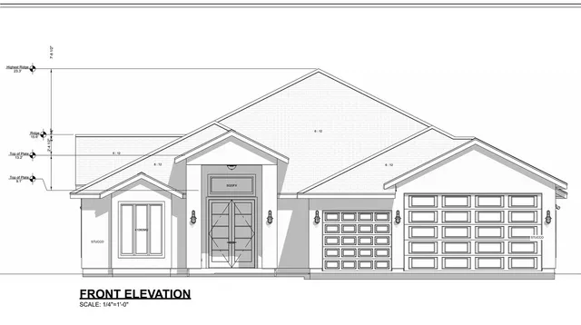 a black and white photo of a house