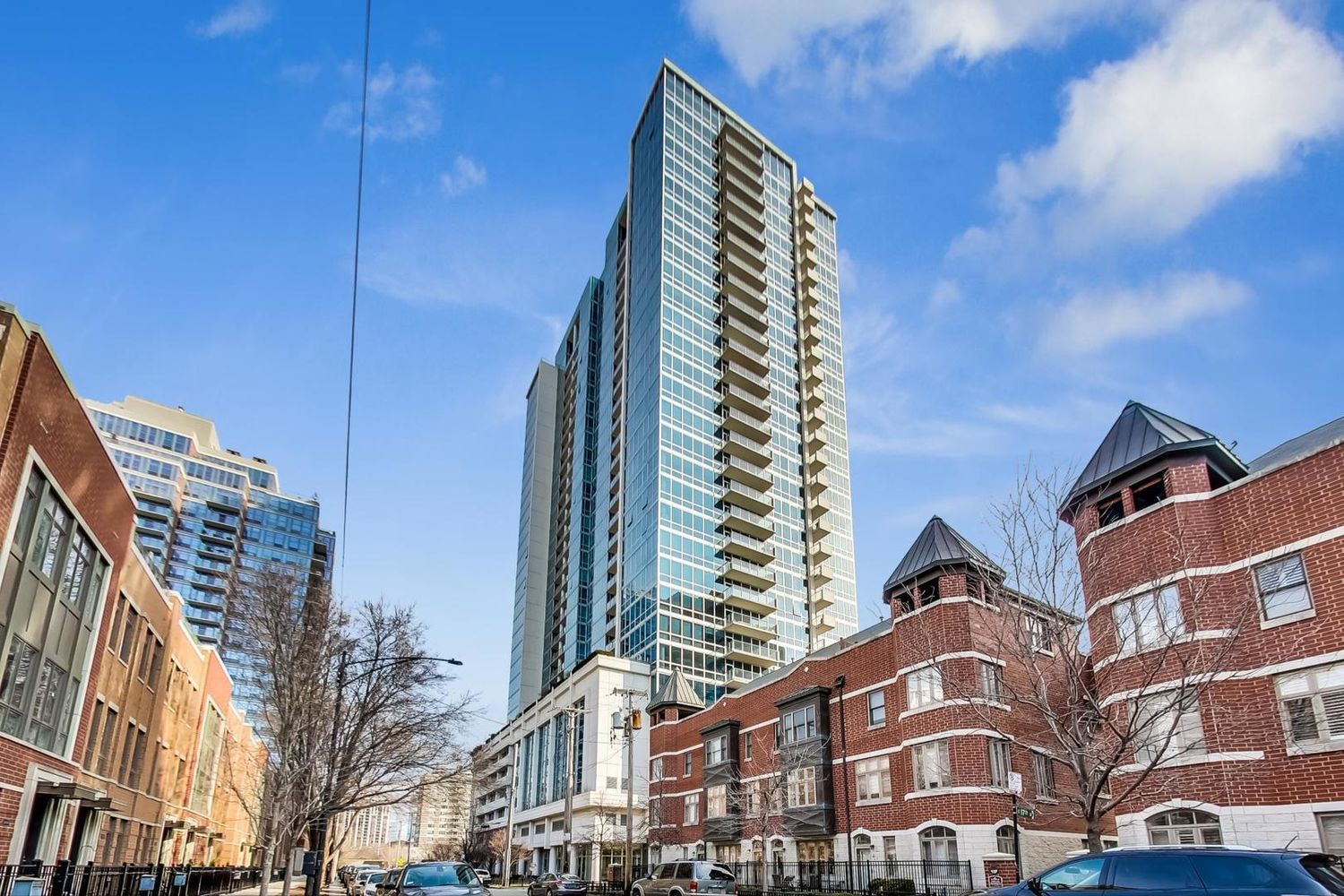 a view of a city with tall buildings