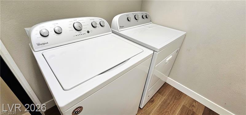 6302 Jackson Spring Road Las Vegas, NV 89118 - Photo 39 of 48 A dedicated laundry space provides ultimate convenience with a pristine washer and dryer set.