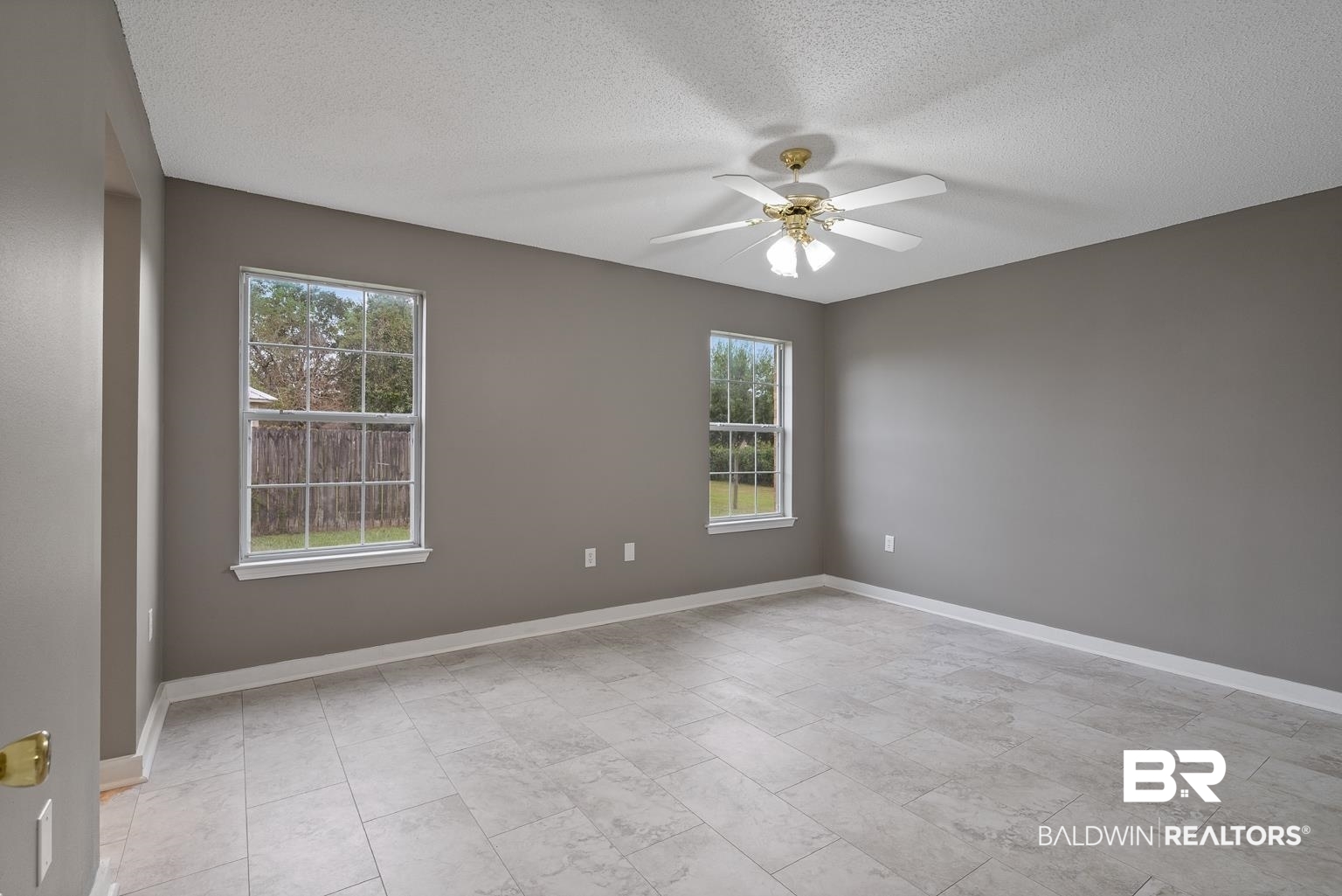 16418 Avent Lane Foley, AL 36535 - Photo 22 of 30 Empty room with a textured ceiling and ceiling fan
