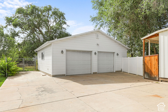 154 South State Street Morgan, UT 84050 - Photo 20 of 25 Detached two-car garage with white vinyl siding