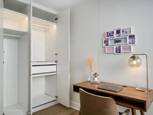 a room with a table and workspace