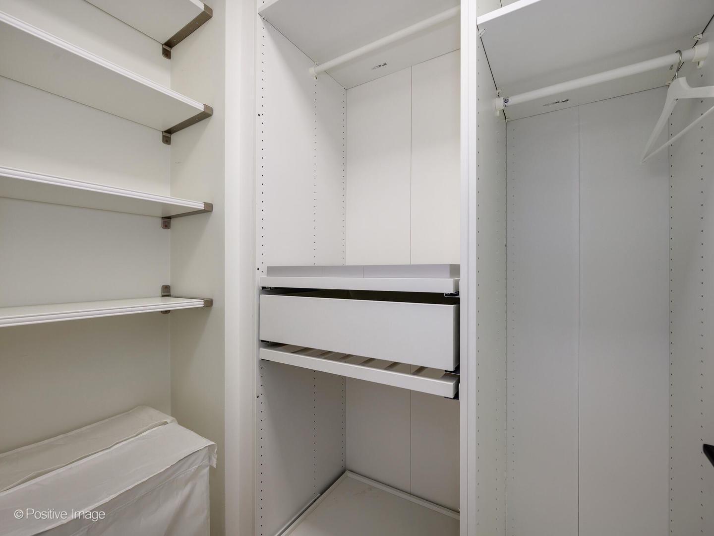 1355 North Sandburg Terrace, Unit 2201D Chicago, IL 60610 - Photo 22 of 44 a utility room with closet