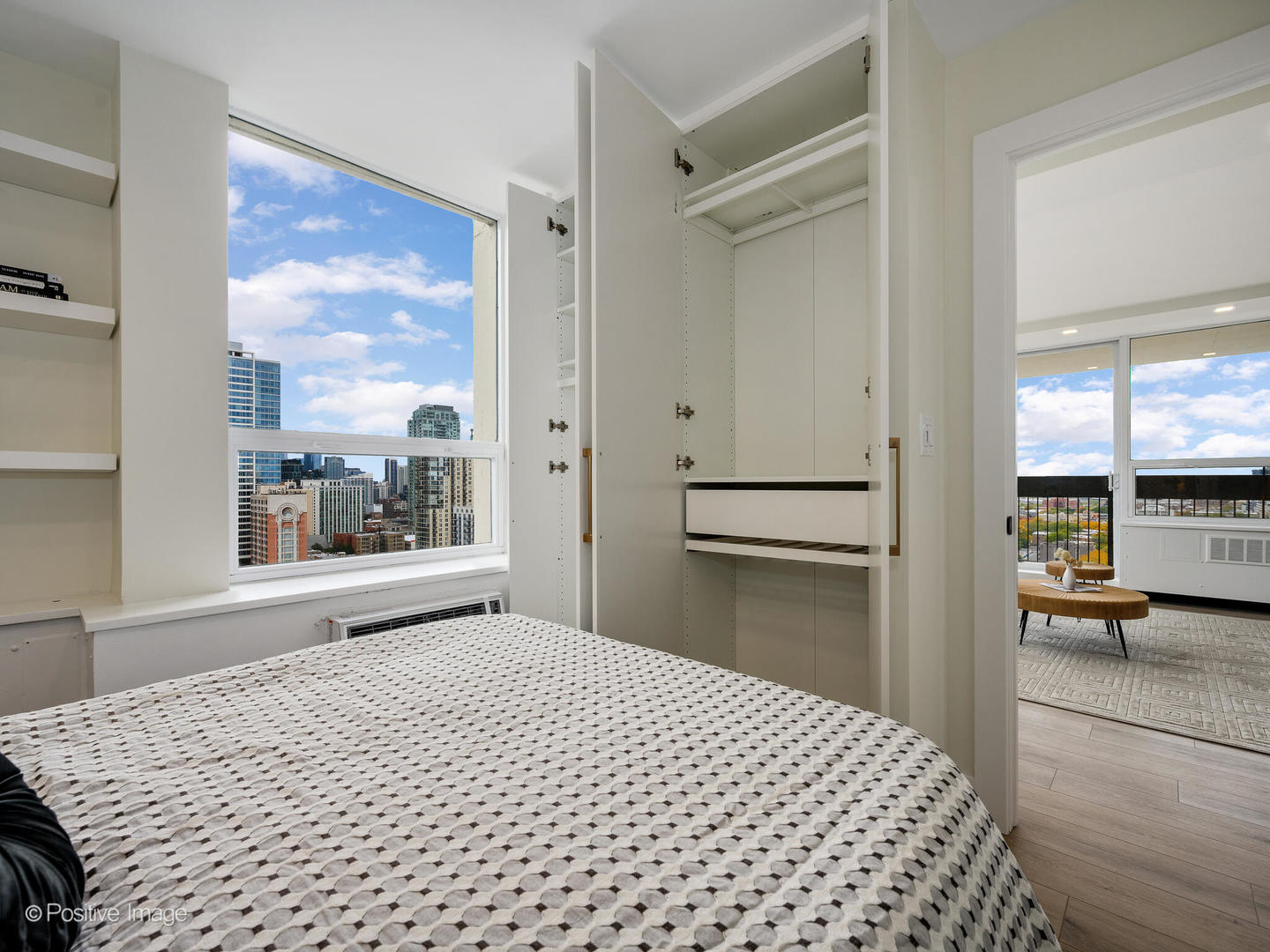 1355 North Sandburg Terrace, Unit 2201D Chicago, IL 60610 - Photo 25 of 44 a bedroom with a bed and a window