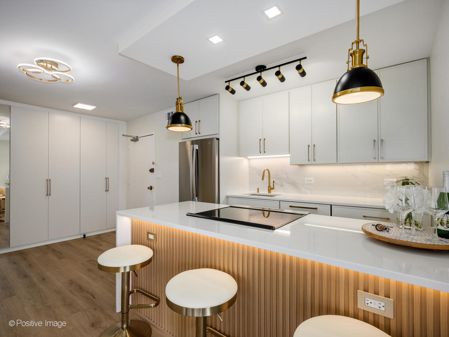 1355 North Sandburg Terrace, Unit 2201D Chicago, IL 60610 - Photo 4 of 44 a dining room with furniture and a chandelier