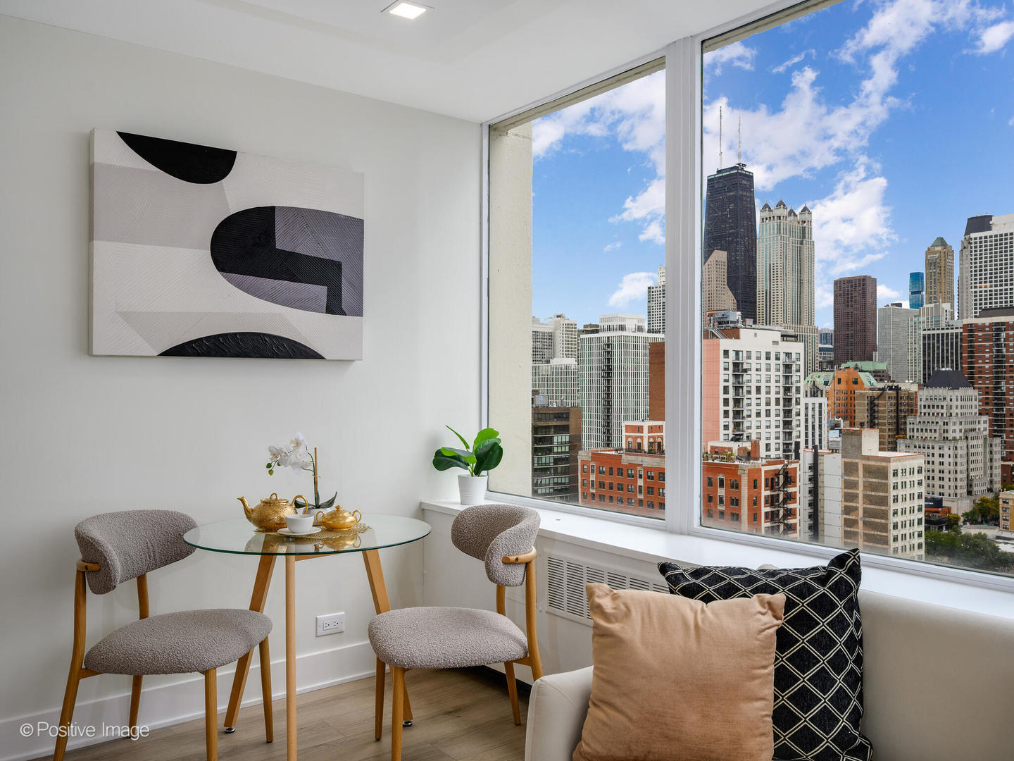 1355 North Sandburg Terrace, Unit 2201D Chicago, IL 60610 - Photo 10 of 44 a living room with furniture and a floor to ceiling window
