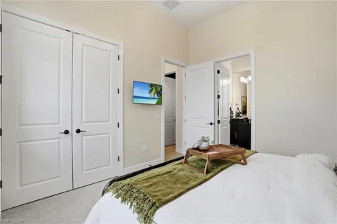 a spacious bathroom with a sink a mirror and a shower