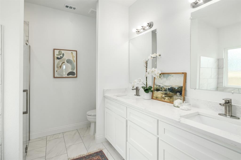 228 Windjammer Road Gun Barrel City, TX 75156 - Photo 13 of 19 a bathroom with a sink a toilet and mirror