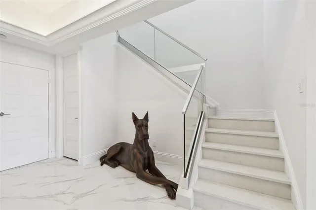 a view of a chairs and table in patio
