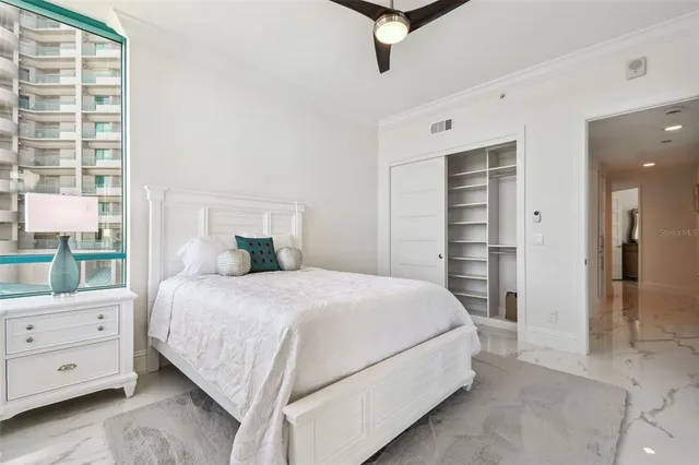 a view of a swimming pool with sitting area