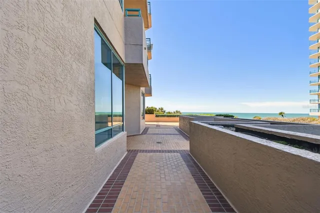 a kitchen with stainless steel appliances a sink a stove and a window