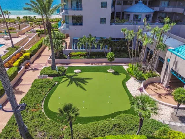 a view of a city that has tall buildings and ocean view