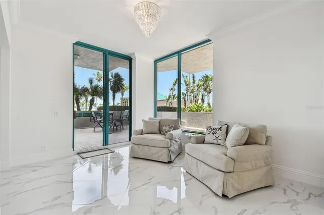 a kitchen with stainless steel appliances a sink stove and cabinets
