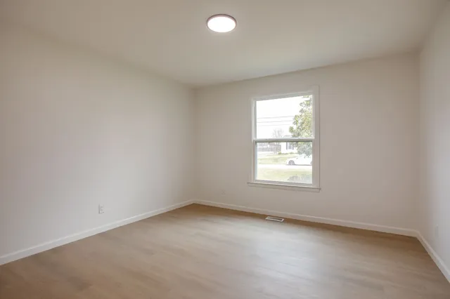 an empty room with a window