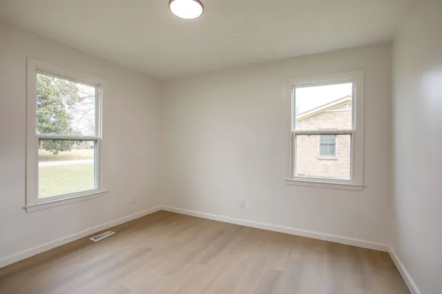 an empty room with a window